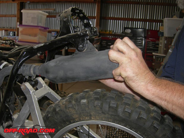 The muffler is the final part of exhaust system. Make sure that the packing inside is not all oiled up.