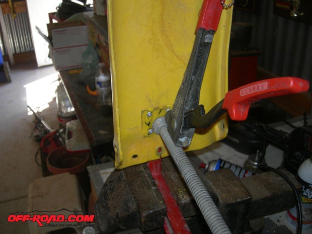 A large clamp lined everything up to make the pop riveting go easier.