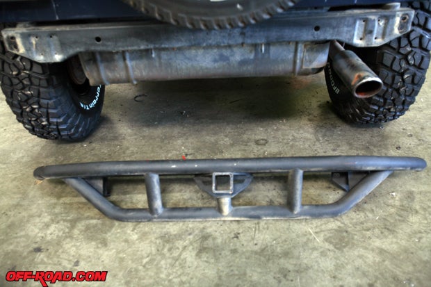 Two things we wanted to change is the aftermarket rear bumper, and the chrome tip on the Magnaflow exhaust just had to go. We removed the bumper, which will later be replaced by a new Bestop high-clearance bumper, and we cut off the chrome tip of the exhaust. 