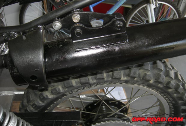 The muffler/spark arrestor combination took a lot of bolts but was modern solidly. Its a good thing too, as it was fairly heavy.