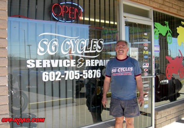 Here is the man who got us running in front of his shop.