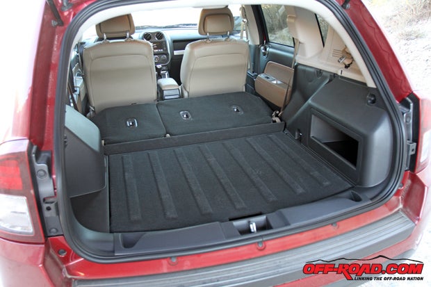 With the rear seats folded down, the Compass provides a decent amount of storage space for a compact SUV. The front passenger seat can also fold down if additional space is needed. 