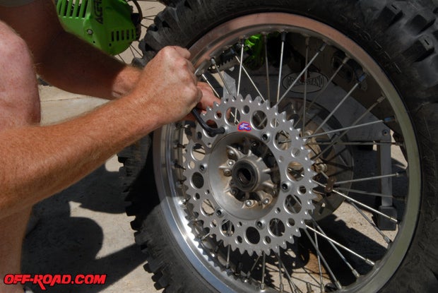 When bolting the rear sprocket back into place, put each bolt on finger tight first and then be sure to tighten the bolts in a star pattern. This avoids the over-tightening of any one bolt and allows the sprocket to sit flush against the wheel.