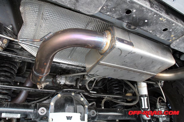 Road Road Motorsports fitted its axle-back exhaust system for the 2012 Wrangler. Not only does the exhausts design tuck up higher than stock for added trail clearance, it also does not have a loud, obnoxious tone.