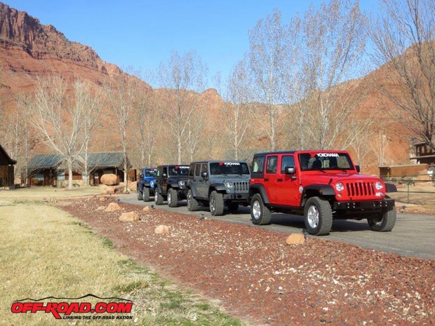 We lined up at the Sorrel River Resort prior to hitting the road for the 20-mile trip into Moab. All these Wranglers are rentalsperhaps you noticed the side decalsfrom Canyonlands Jeep Adventures. Theyre all Sport models and are restricted from the more challenging trails. The tires exhibited excellent highway manners with no noise and good traction.