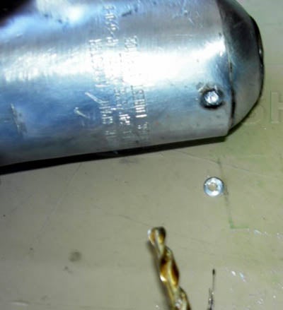 When the rivet is drilled through, a large flat piece is left over.