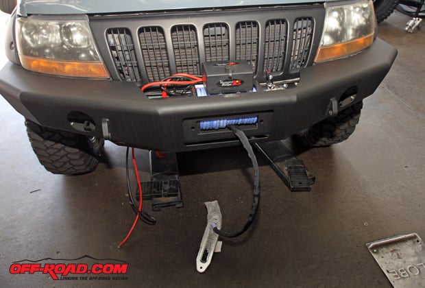 We also added a Rugged Ridge winch to our WJ, which fortunately was possible to do even after the bumper was installed  though some large winches may require installation prior to the bumper being installed. 