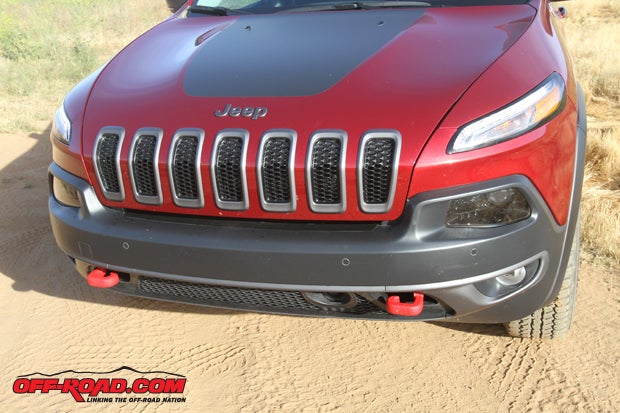 The Trailhawk comes with the signature red tow hooks up front.