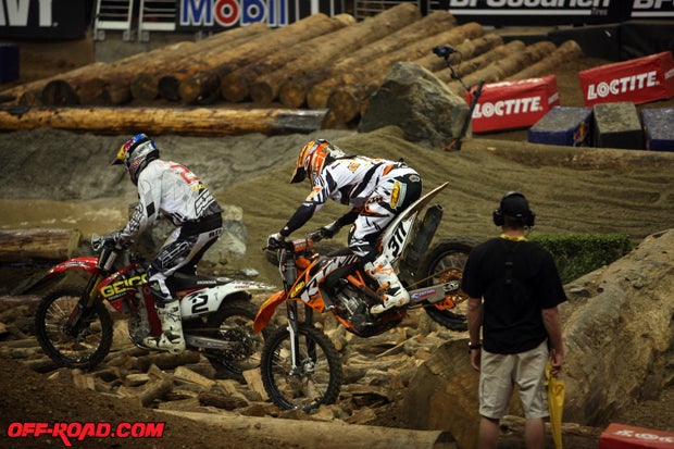 Destry Abbott (2) and Mike Brown (311) tackle the wood pit. 