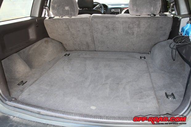 Without a cargo liner, the Jeep's fabric material is all that's left to battle dirt and grime. 