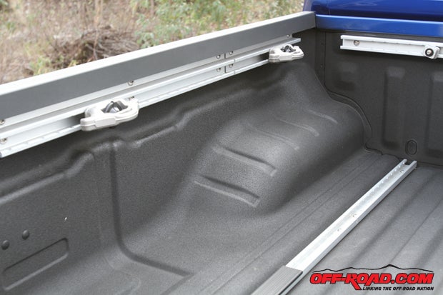The Frontiers 5-foot bed features the best storage-securing system of the bunch with its Utili-track Channel System that features four tie-down cleats that can be moved around the side of the bed or along two channels incorporated into the floor.