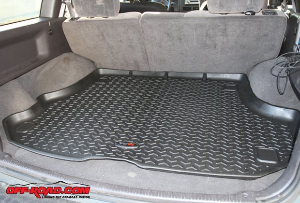 The rear cargo liner fits nicely in the back of our WJ. 