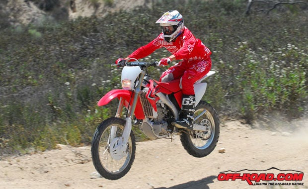 Hondas CRF450X has the feel of Open-class off-road performance with a tractable engine, stable chassis and plush, controlled suspension.