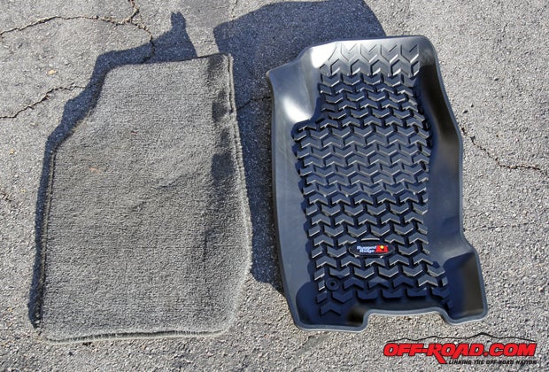 Out with the old and in with the new. We swapped out our cheap fabric mats for Rugged Ridge’s All-Terrain Floor Liners. 