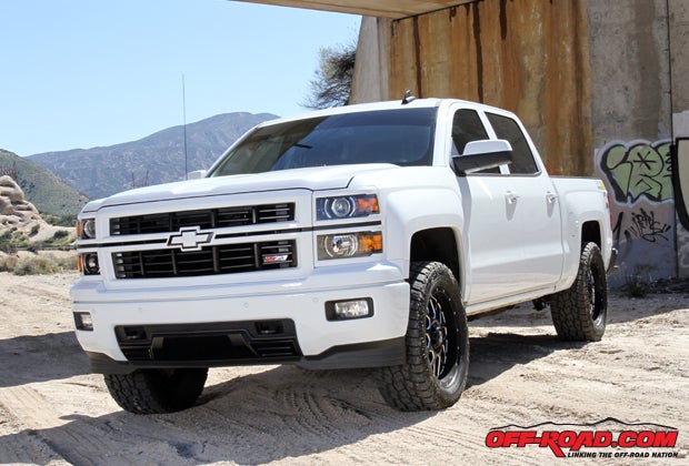 The chrome was removed from Tickle's 2015 Silverado and color-matched with the truck. 