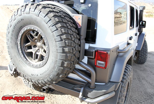 The rear bumper also safely accommodates the 37-inch spare. Behind it is a cannister for additional fuel. 