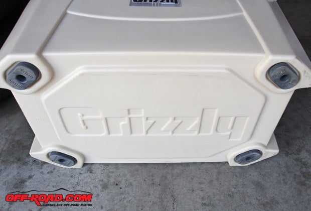 Grizzly Coolers fitted rubber stops on each corner of the cooler to keep it from sliding no matter what surface it rests upon. 