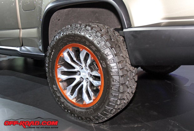 Custom 18-inch wheels are fitted with 32-inch Goodyear tires on teh ZR2. Sure, they could cram 33s or 35s under there, but the 32s offer plenty of additional ground clearance for the trails. 