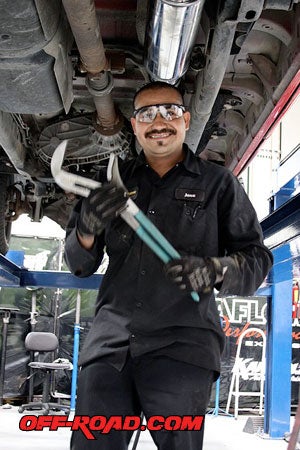 Jose Cruz, the MagnaFlow maestro, was assigned to our truck. Before we could get our camera out--Jose already had the Mega Cab on the lift and removing the old pipe and muffler.